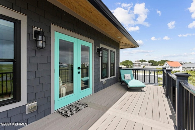 wooden deck with french doors