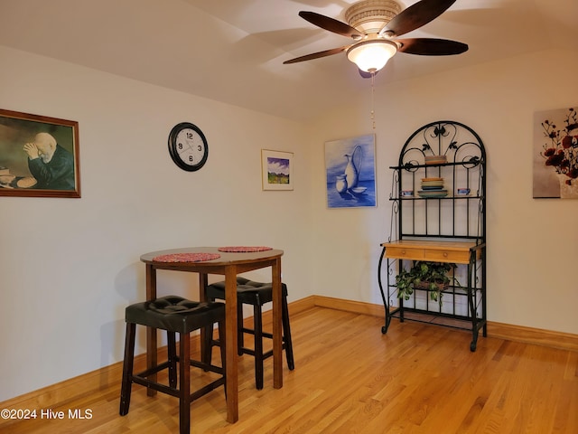 dining area featuring ceiling fan and light hardwood / wood-style flooring