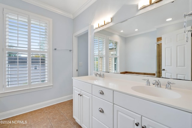 bathroom featuring vanity, crown molding, walk in shower, and tile patterned floors