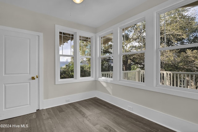 unfurnished sunroom featuring a wealth of natural light