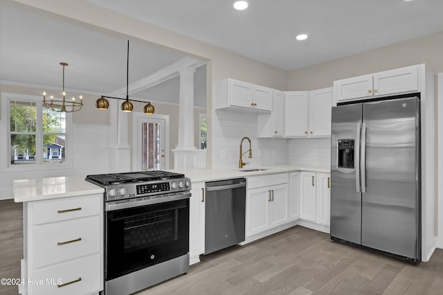 kitchen featuring light hardwood / wood-style flooring, stainless steel appliances, white cabinetry, and sink