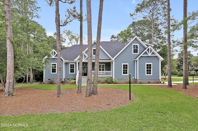 145 Eagle Ct SW, Supply, NC 28462 - craftsman inspired home with a front lawn and covered porch