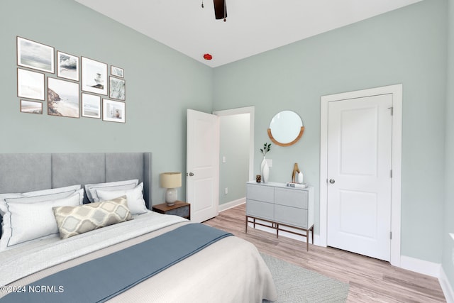 bedroom featuring ceiling fan and hardwood / wood-style flooring