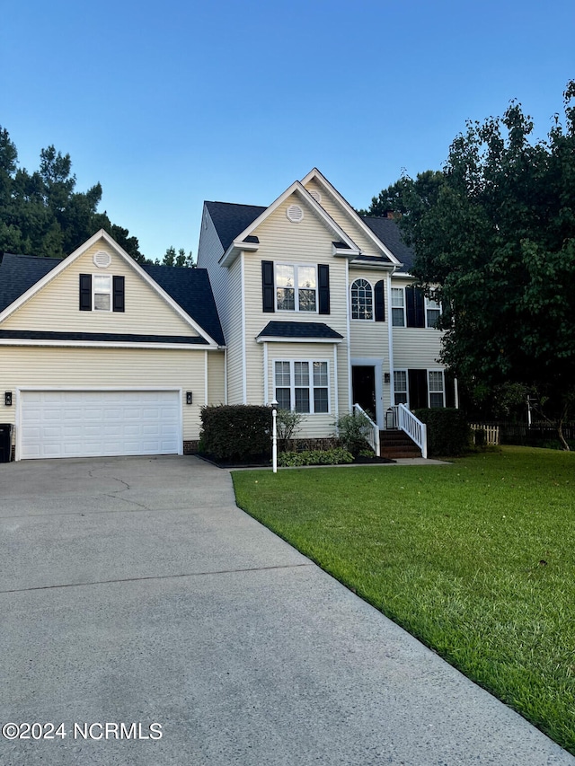 view of front property with a front lawn