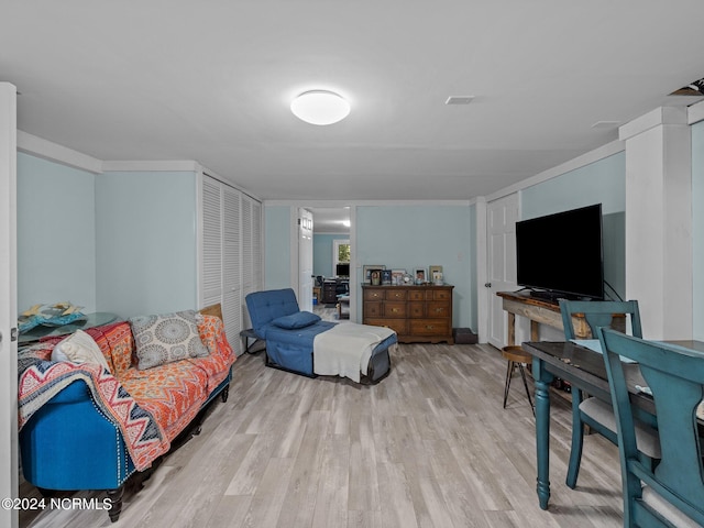 living room with light hardwood / wood-style floors