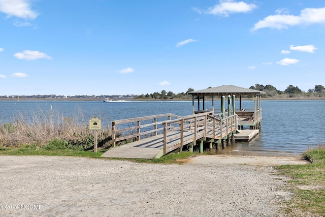 dock area featuring a water view and a gazebo