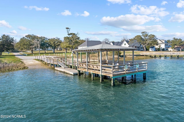 dock area featuring a water view