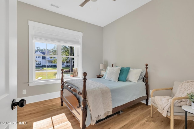 bedroom featuring ceiling fan and light wood-type flooring