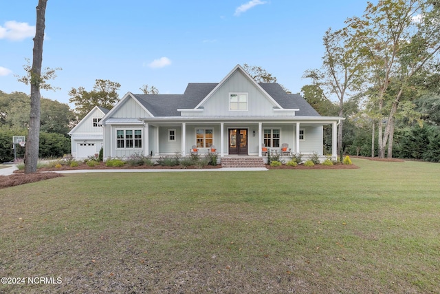 view of front of property with covered porch and a front yard