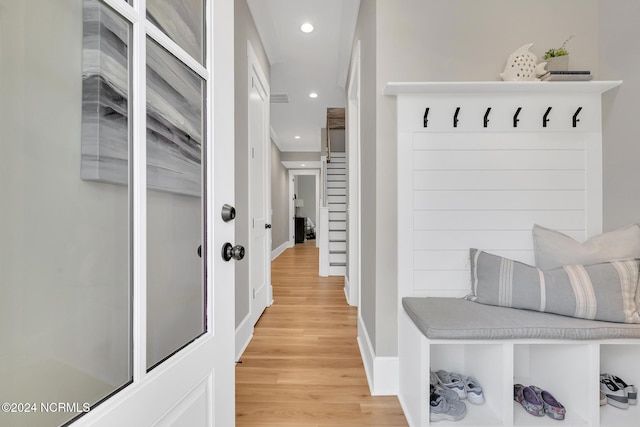 mudroom with hardwood / wood-style flooring