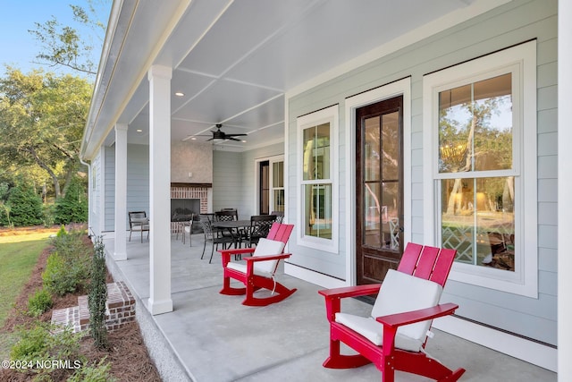 view of patio featuring ceiling fan