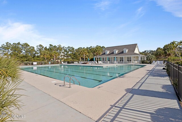 view of swimming pool featuring a patio