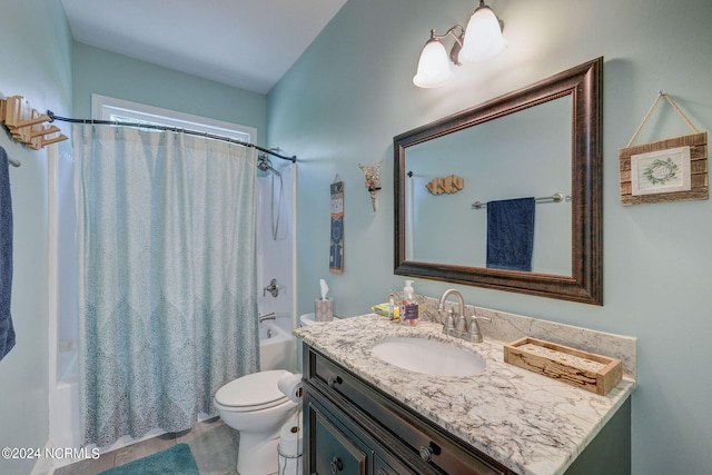 full bathroom with vanity, toilet, and shower / bath combo