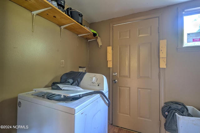 701 Anne St, Laurinburg, NC 28352 - laundry room featuring laundry area and wood finished floors