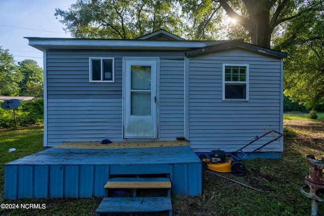 701 Anne St, Laurinburg, NC 28352 - rear view of house featuring a wooden deck