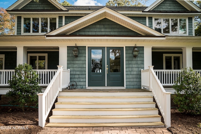 property entrance with a porch