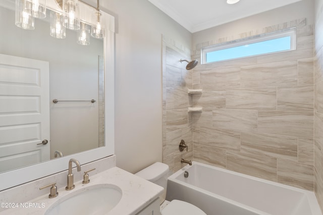 full bathroom featuring vanity, toilet, tiled shower / bath combo, and ornamental molding