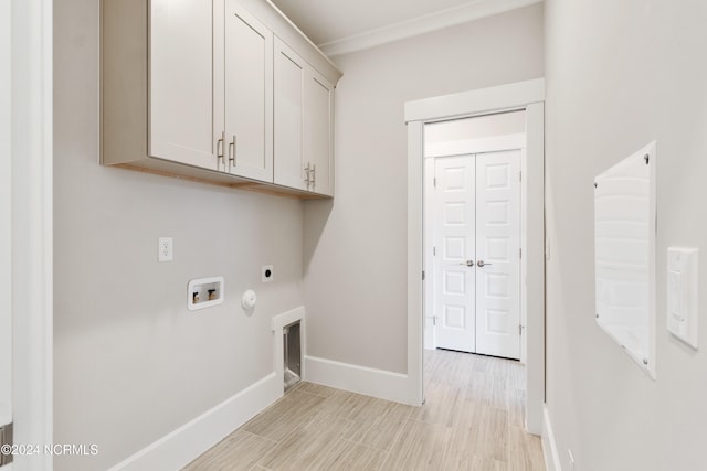 washroom with hookup for a gas dryer, electric dryer hookup, hookup for a washing machine, cabinets, and light hardwood / wood-style floors