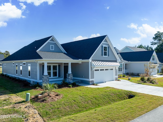 craftsman-style home with a front lawn and a porch