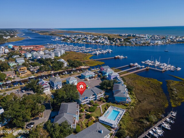 birds eye view of property featuring a water view