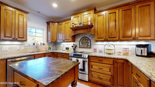 kitchen with tasteful backsplash, appliances with stainless steel finishes, sink, and dark stone counters