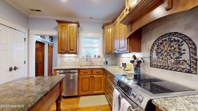 kitchen with ornamental molding, appliances with stainless steel finishes, sink, and decorative backsplash