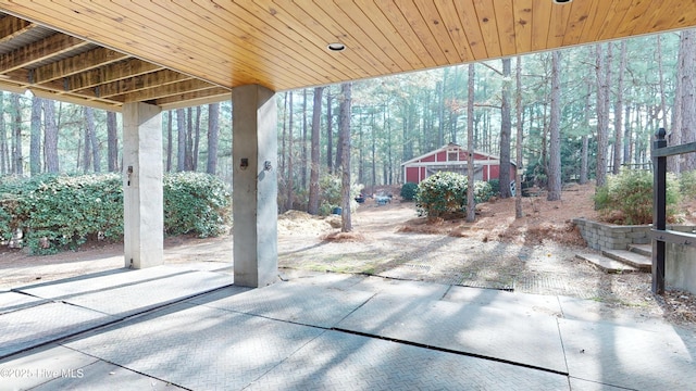 view of patio with a shed