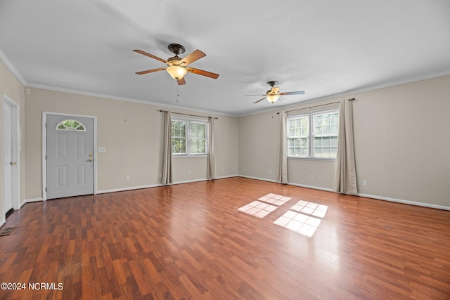 interior space featuring dark wood-type flooring and plenty of natural light