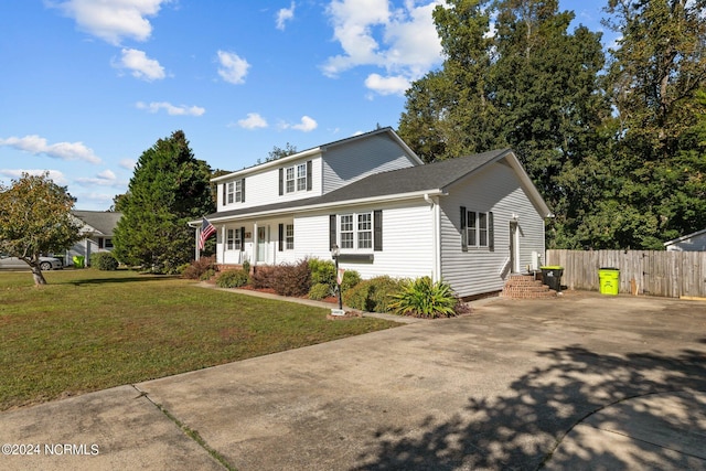 front of property featuring a front lawn