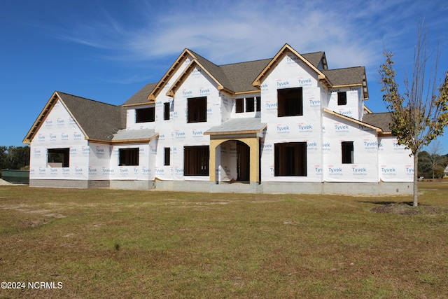 property in mid-construction with a front yard