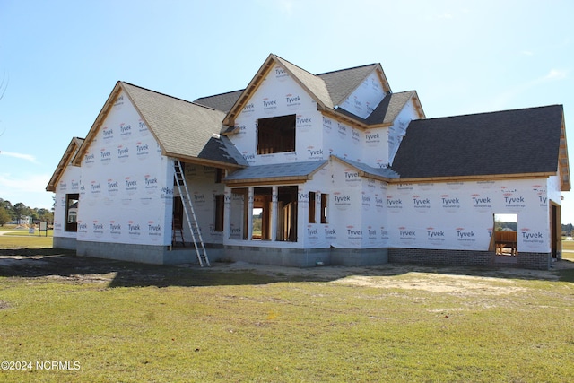 unfinished property featuring a front yard