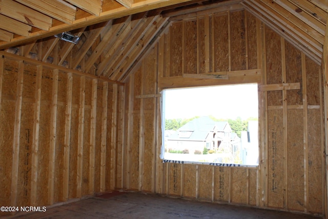 misc room with lofted ceiling