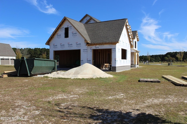 3413 Autumn Breeze Ct, Grimesland, NC 27837 - view of property exterior featuring a shingled roof and a yard