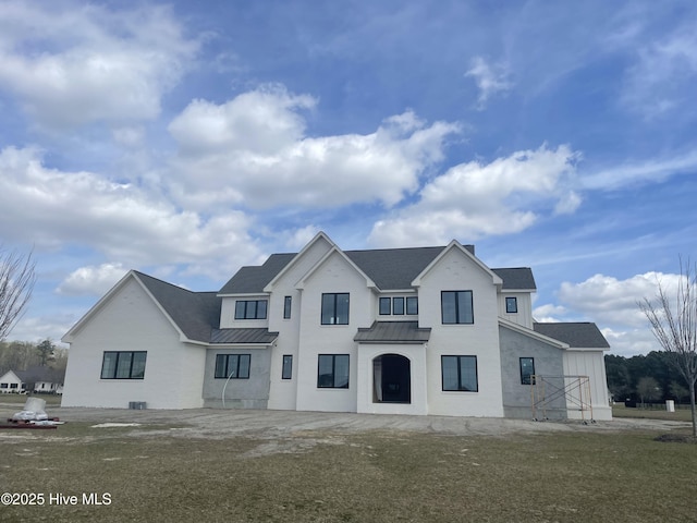 3413 Autumn Breeze Ct, Grimesland, NC 27837 - view of front of home with a standing seam roof and a metal roof