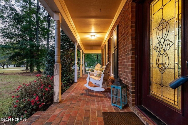 view of patio featuring a porch