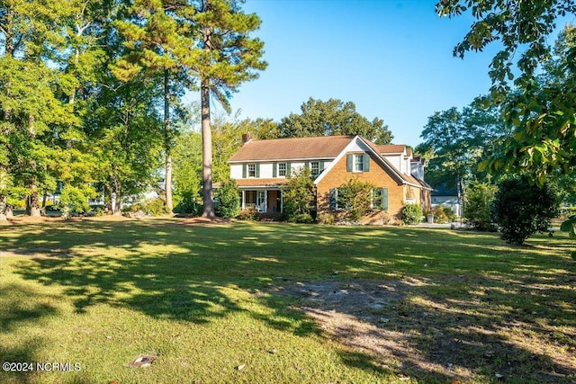 view of front of house with a front lawn