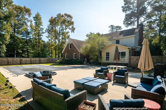 view of patio with an outdoor living space