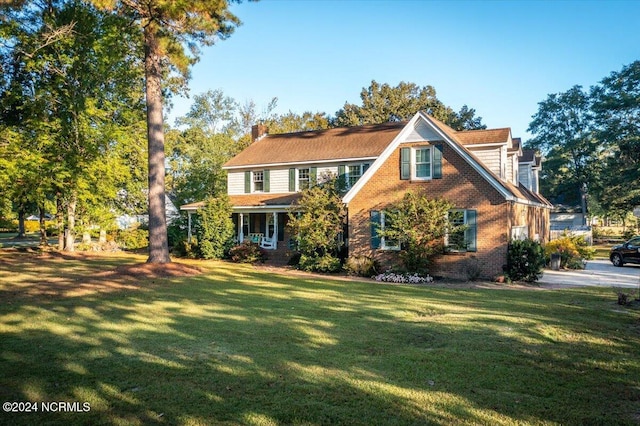 view of front of home with a front yard