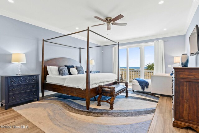 bedroom featuring light hardwood / wood-style floors, ceiling fan, access to exterior, and ornamental molding