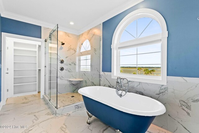 bathroom featuring ornamental molding, tile walls, and independent shower and bath