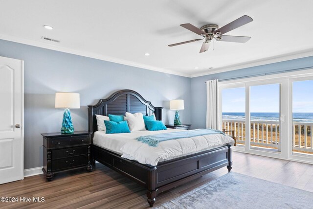 bedroom featuring a water view, ornamental molding, ceiling fan, dark hardwood / wood-style flooring, and access to outside