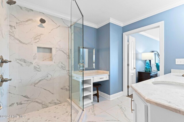 bathroom featuring walk in shower, vanity, and crown molding