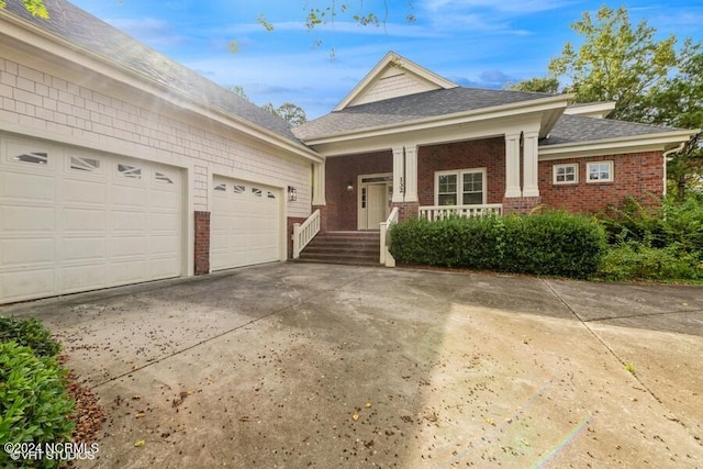 view of front of home featuring a garage