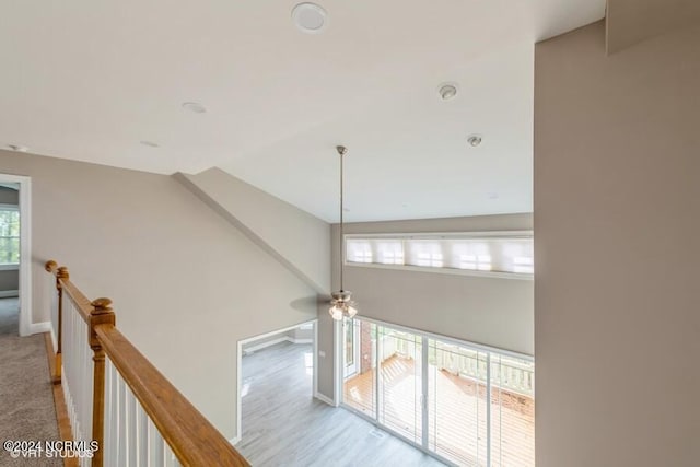 stairway featuring hardwood / wood-style flooring