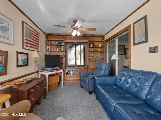 living room featuring built in shelves, carpet, ornamental molding, and ceiling fan