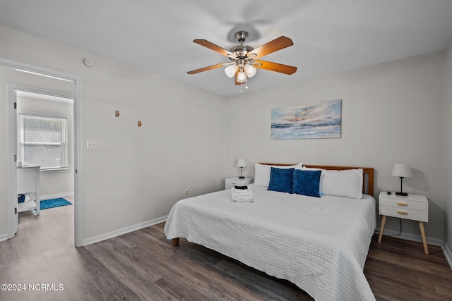 bedroom with ceiling fan and hardwood / wood-style flooring