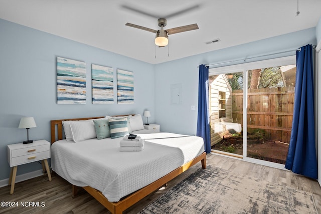 bedroom with hardwood / wood-style flooring and ceiling fan