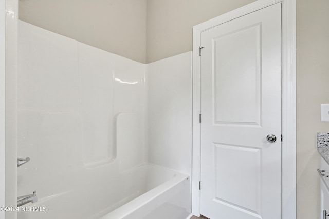 bathroom featuring vanity and bathtub / shower combination