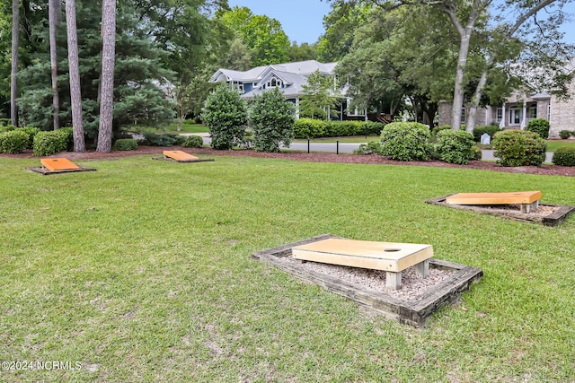 view of home's community with a lawn