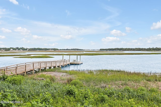 view of dock with a water view